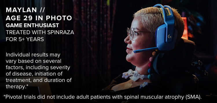 Maylan, age 29 in photo, playing a computer game. Has SMA and has been treated with SPINRAZA for 5+ years.