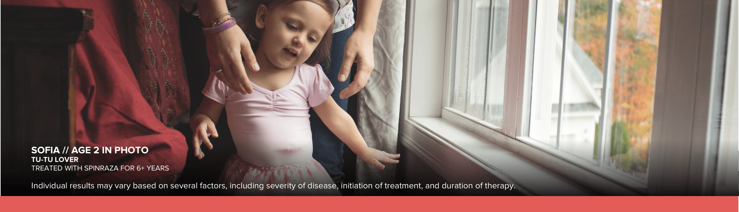 Sofia, age 2 in photo, wearing a pink tutu. Has SMA and has been treated with SPINRAZA for 6+ years.