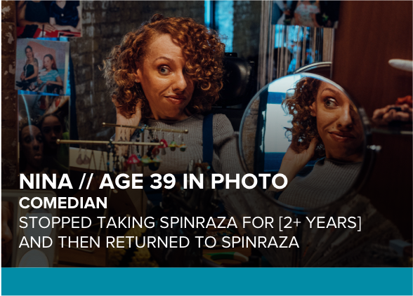 Nina, age 39 in photo, has SMA and is pictured looking in a mirror. Aspiring comedian treated with SPINRAZA for 5+ years.