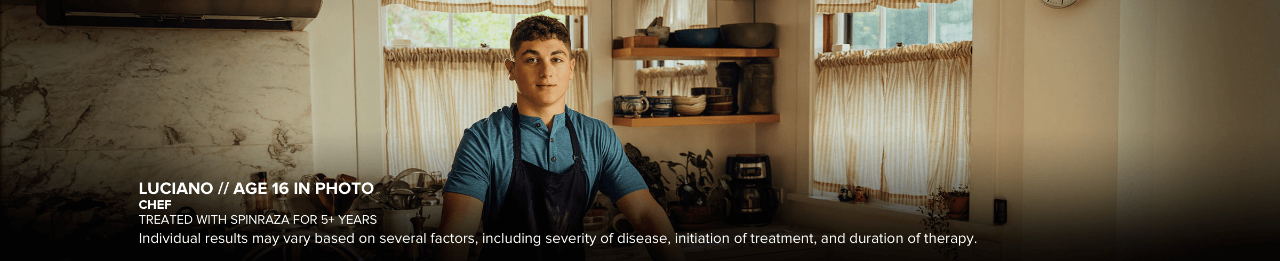 Luciano, age 16 in photo, has SMA and is pictured cooking inside a kitchen. Has been treated with SPINRAZA for 5+ years.
