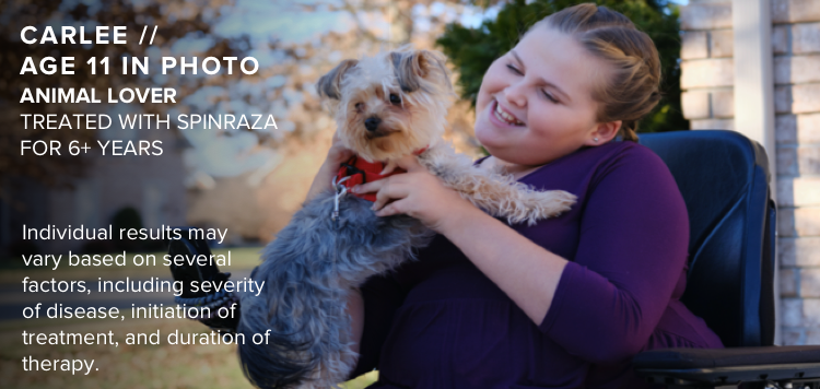 Carlee, age 11 in photo, playing with a dog outdoors. Has SMA and has been treated with SPINRAZA for 6+ years.